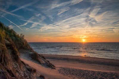 Sunset coast near the hill
